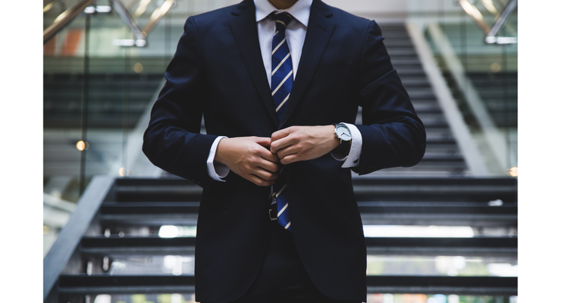 Person in suit at work