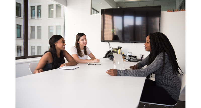 Three people taking part in interview