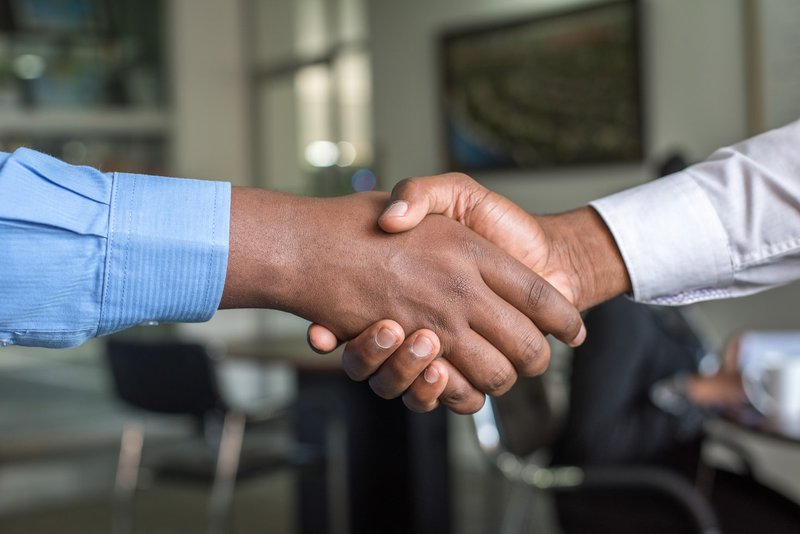 Handshake between two people